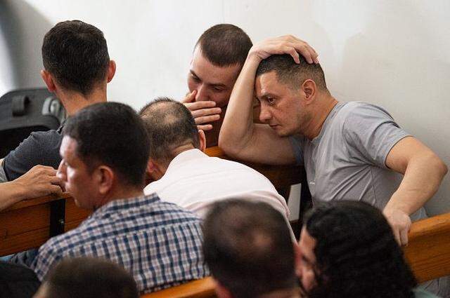 Colombian men accused of involvement in the assassination of former Haitian President Jovenel Moise, attend a hearing at the Court of Appeals in Port-au-Prince, Haiti, on June 9, 2025. Haitian president Jovenel Moise was assassinated on July 7, 2021 in his Port-au-Prince residence. (Photo by Clarens SIFFROY / AFP) (Photo by CLARENS SIFFROY/AFP via Getty Images)