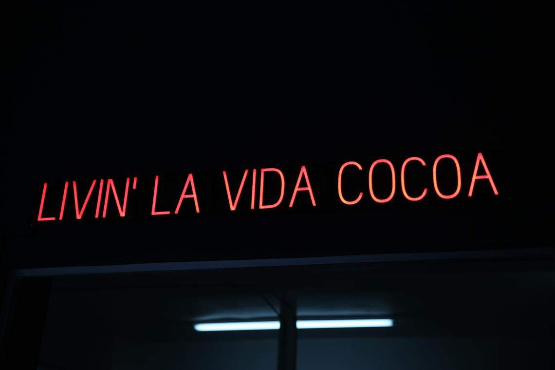 A neon sign inside Exquisito Chocolates, Miami's first chocolate factory that will be opening soon in Little Havana.