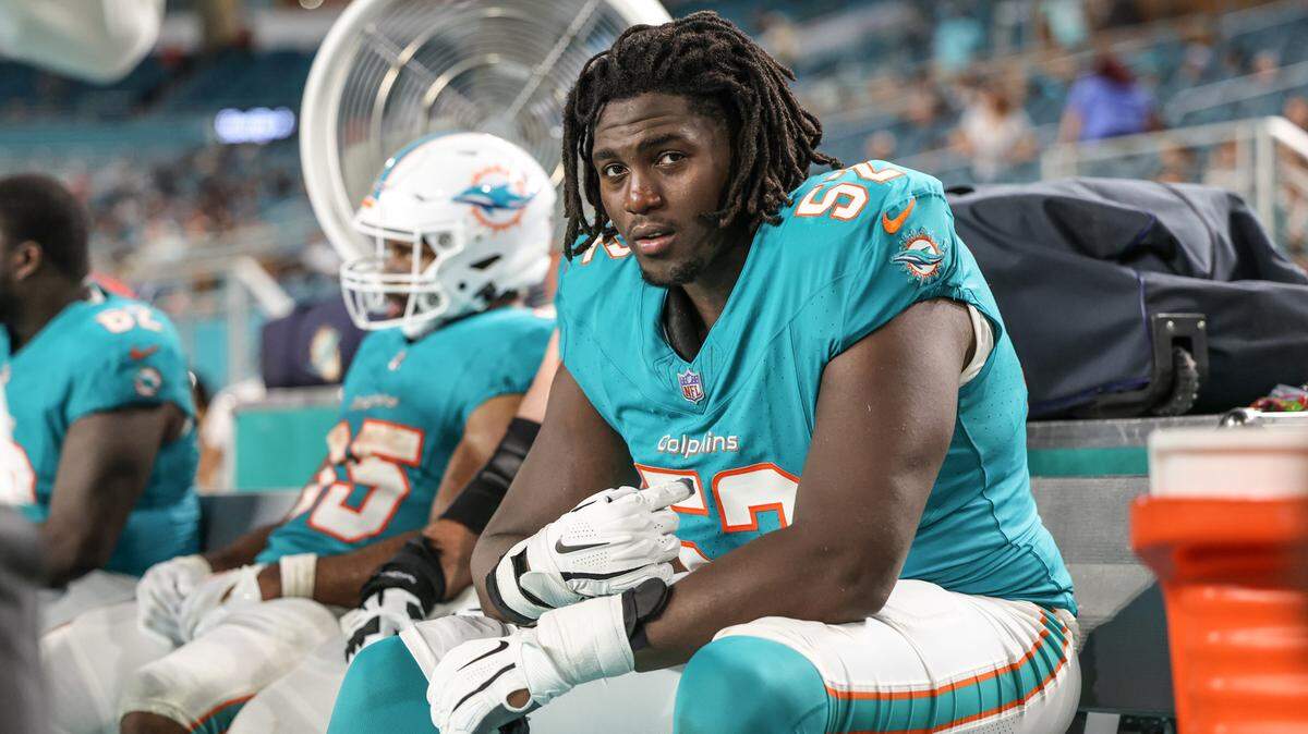 Miami Dolphins offensive tackle Patrick Paul (52) on the bench late in the game against the Atlanta Falcons at Hard Rock Stadium, in Miami Gardens, Florida on Friday, August 9, 2024. 
