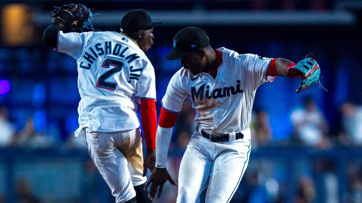 Miami Marlins players Jazz Chisholm and Jesus Sanchez react in the infield after defeating the Phillies 11-3 following the ninth inning of a baseball game at LoanDepot Park on Sunday, April 17, 2022 in Miami, Florida.