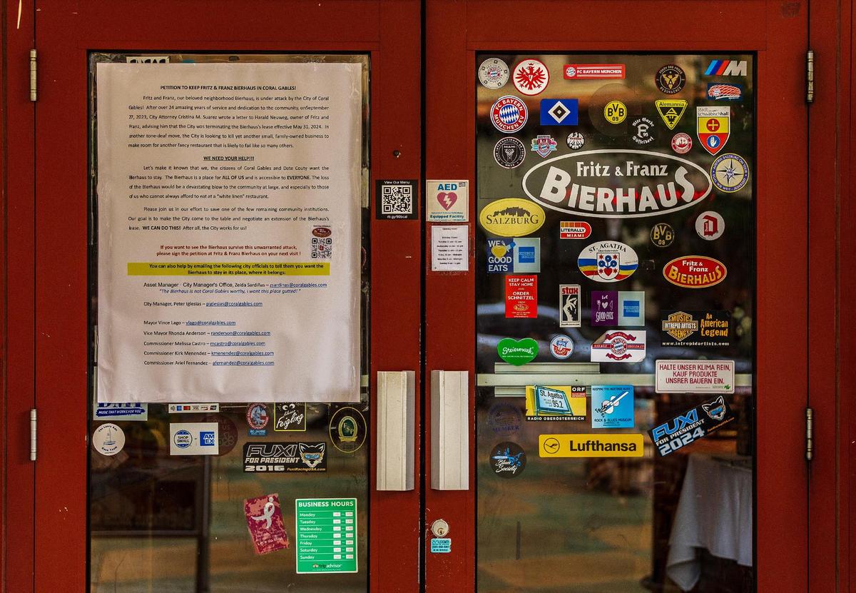 View of a petition posted on the door of the iconic Fritz & Franz Bierhaus restaurant by owner Harald Neuweg requesting support from the community as he may be losing its lease after almost 25 years.