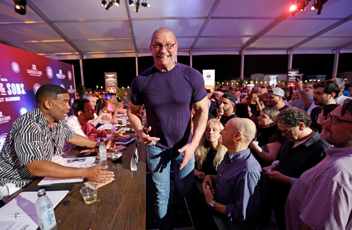 English celebrity chef and talk show host Robert Irvine is one of several judges at Burger Bash presented by Schweid & Sons during the South Beach Wine & Food Festival on the sand by the Ritz Carlton in Miami Beach, Florida on Thursday, February 23, 2023.