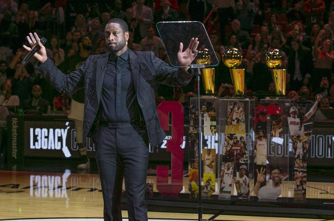Former Miami Heat guard Dwyane Wade reacts during a ceremony for his jersey retirement on February 22, 2020.