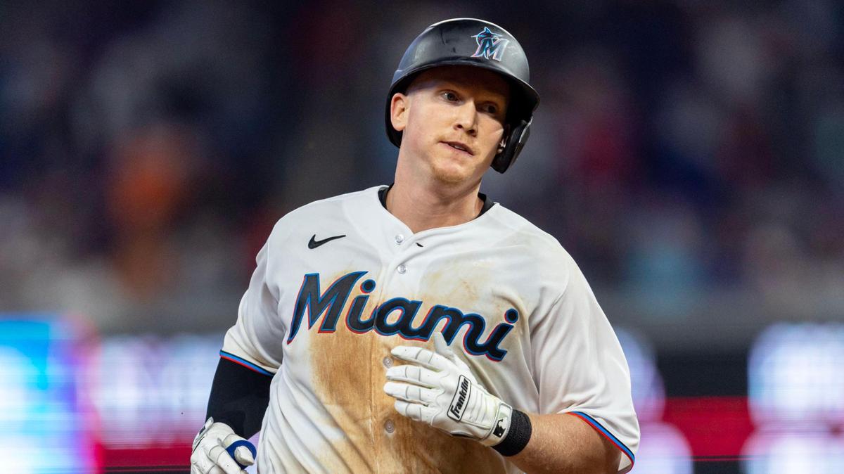 Miami Marlins base runner Garrett Cooper (26) runs the bases after hitting a home run during the sixth inning of an MLB game against the New York Mets at LoanDepot Park in Miami, Florida, on Thursday, March 30, 2023.