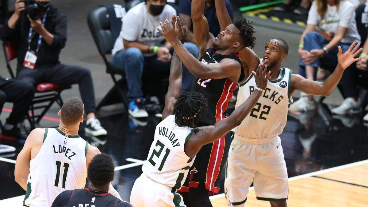 Miami Heat forward Jimmy Butler (22) attempts a shot in the fourth quarter during round 1, game 4 of the NBA playoffs at the AmericanAirlines Arena in Miami on Saturday, May 29, 2021.