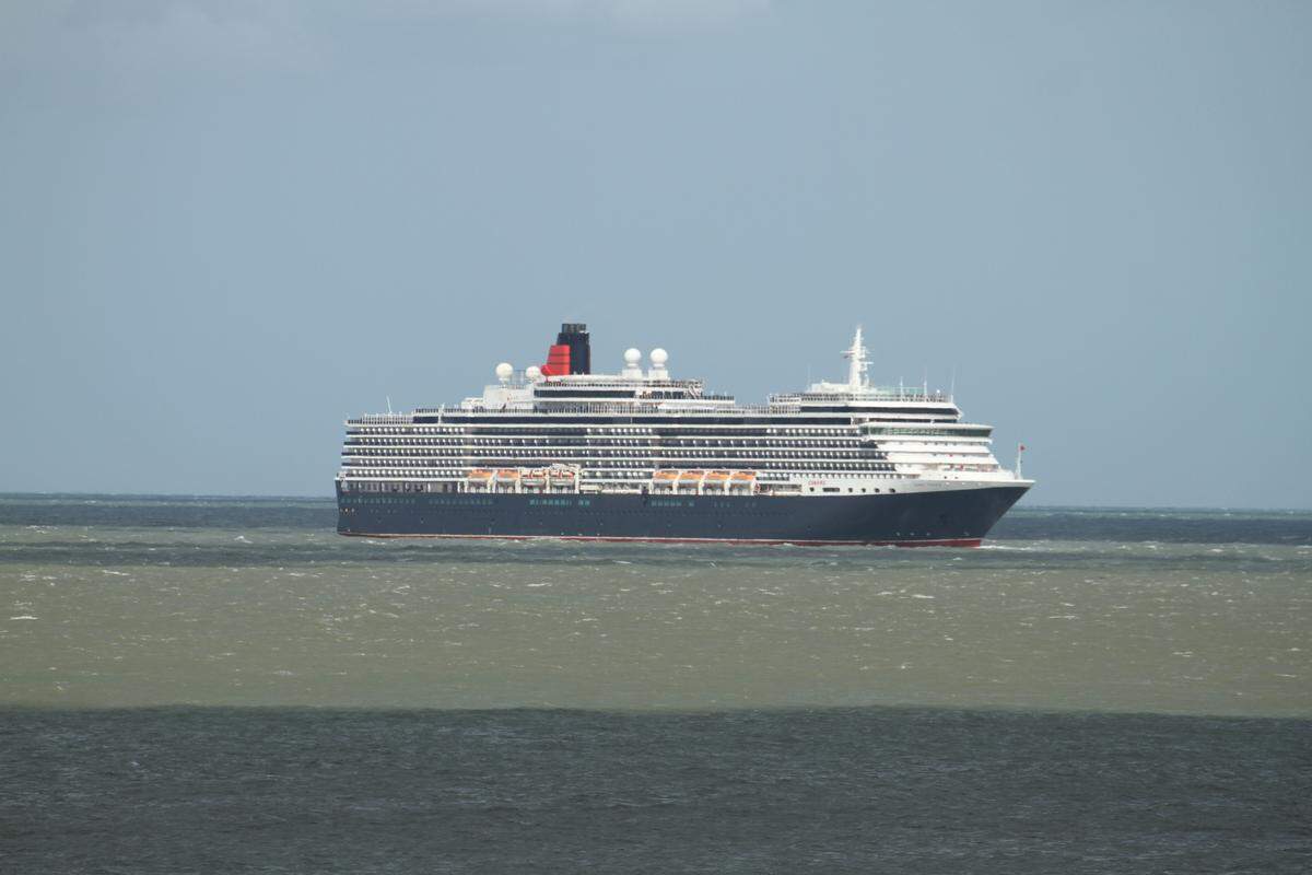 Cunard’s Queen Elizabeth cruise ship, anchored at sea during the pandemic, is seen from Joss Bay, Broadstairs.