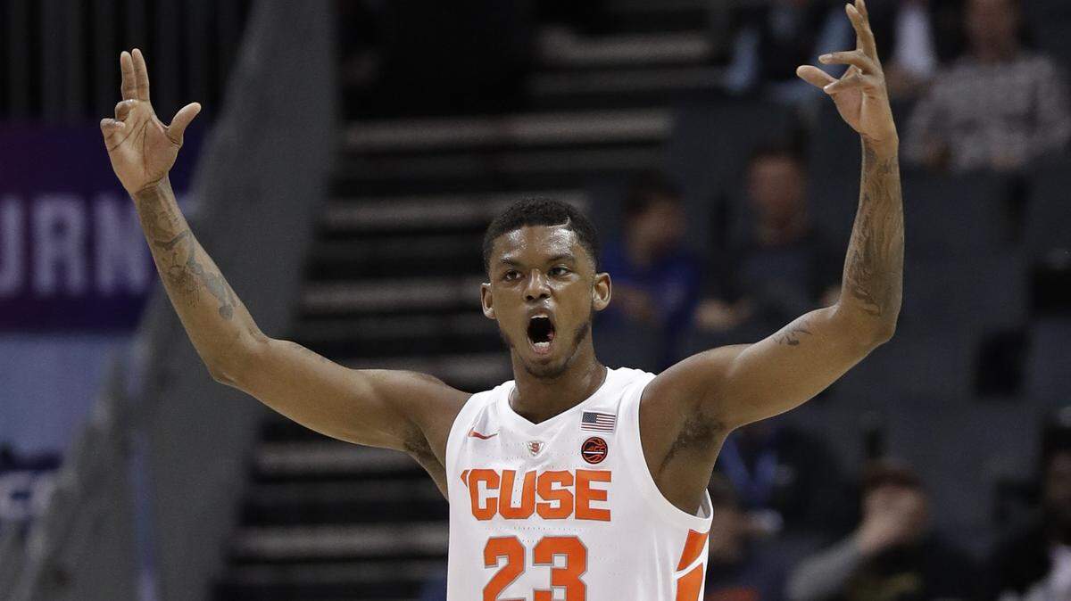 Syracuse’s Frank Howard (23) reacts after a basket against Pittsburgh during the first half of an NCAA college basketball game in the Atlantic Coast Conference tournament in Charlotte, N.C., Wednesday, March 13, 2019. (AP Photo/Chuck Burton)