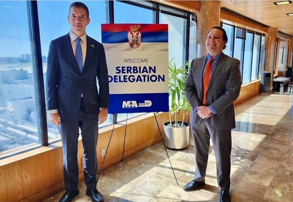 Marko Djuric, Serbia’s ambassador to the United States, left, and TJ Villamil, deputy secretary of FloridaCommerce.