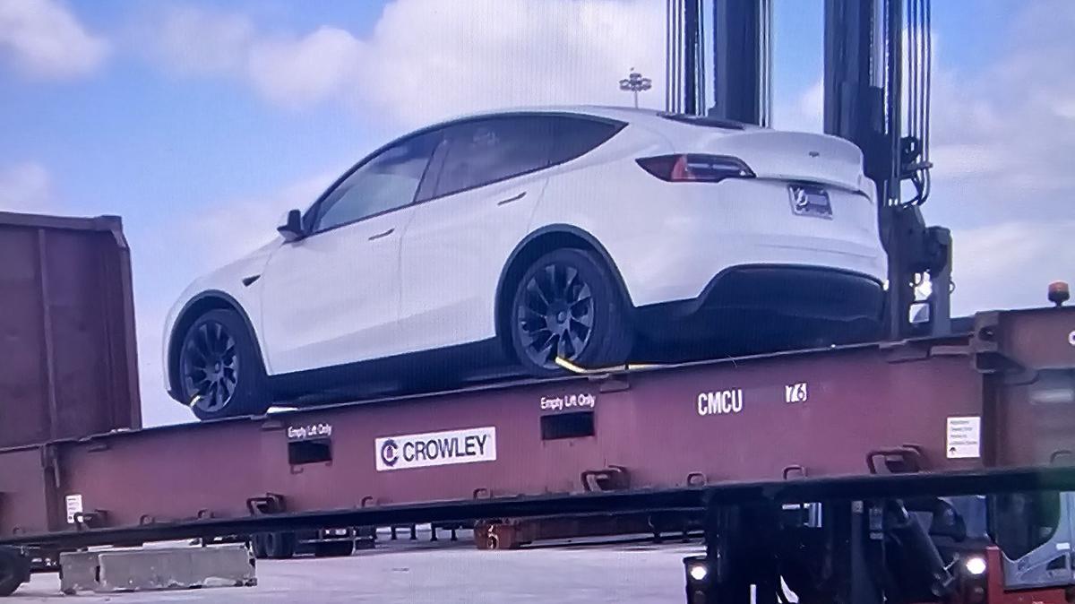 A 2021 Tesla Model headed to the Mariel Port in Cuba was loaded onto a container vessel operated by Florida-based Crowley Holdings at Port Everglades in Florida on November 22, 2023.
