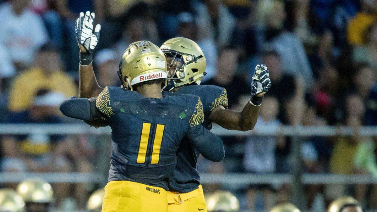St. Thomas Aquinas’ Anthony Solomon (11) celebrates a win during the nationally televised football matchup between DeMatha and St. Thomas Aquinas on Saturday August 25, 2018. St. Thomas won 38-0.