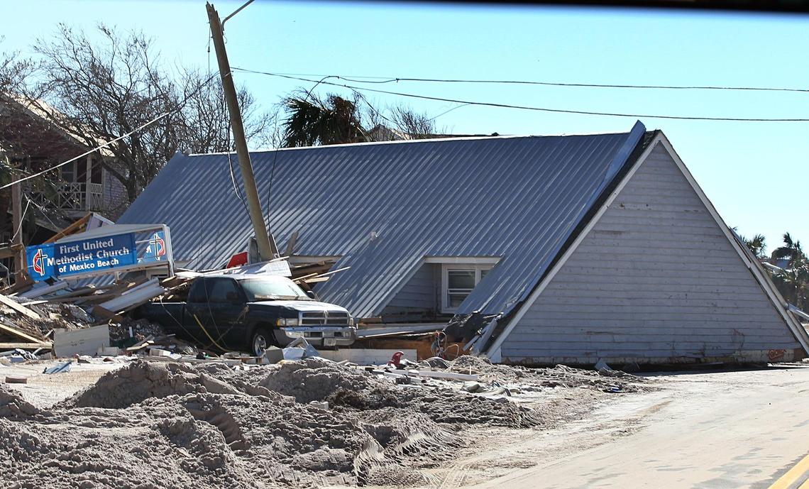 Some buildings lost entire roof structures in Mexico Beach, where cleanup began Friday, two days after Category 4 Hurricane Michael hit the Florida Panhandle.
