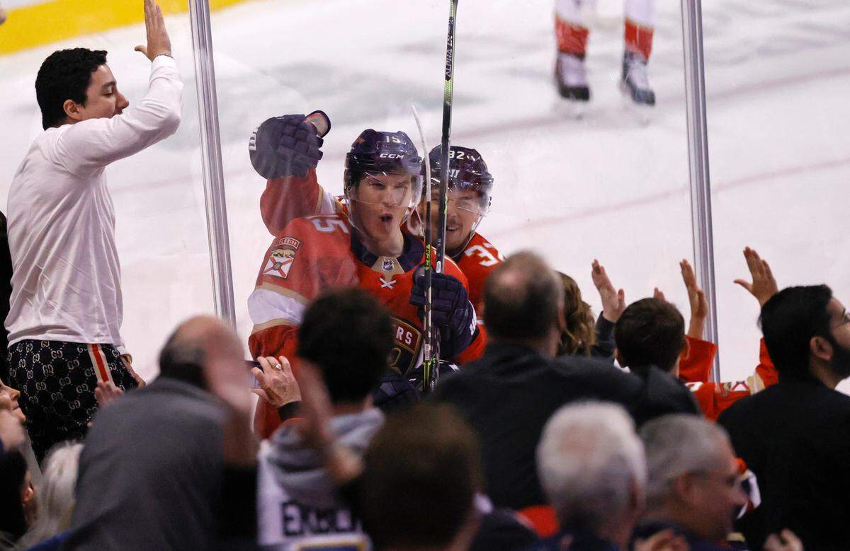Florida Panthers center Anton Lundell (15) celebrates with teammate Lucas Carlsson (32) after scoring a goal against Edmonton Oilers goaltender Mikko Koskinen (19) during the first period of an NHL game at the FLA Live Arena on Saturday, February 26, 2022 in Sunrise, Fl.