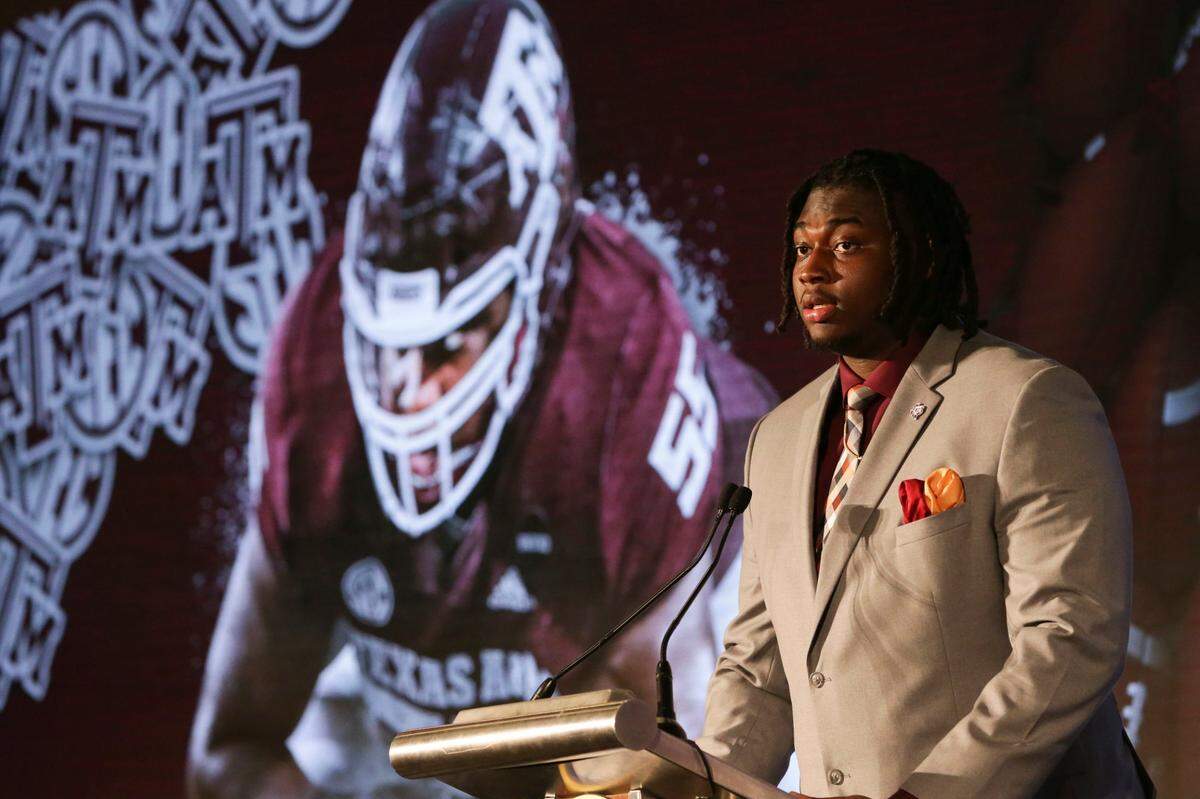 FILE - Texas A&M’s Kenyon Green speaks to reporters during the NCAA college football Southeastern Conference Media Days, in Hoover, Ala., in this Wednesday, July 21, 2021, file photo. Green was selected to The Associated Press Preseason All-America first team offense, Monday Aug. 23, 2021.(AP Photo/Butch Dill, File)