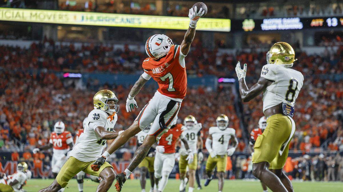 Miami Hurricanes wide receiver CJ Daniels (7) on a one handed catch for the touchdown in the second quarter against the Notre Dame Fighting Irish during an NCAA football game at Hard Rock Stadium in Miami Gardens, Florida, on Sunday, August 31, 2025. 