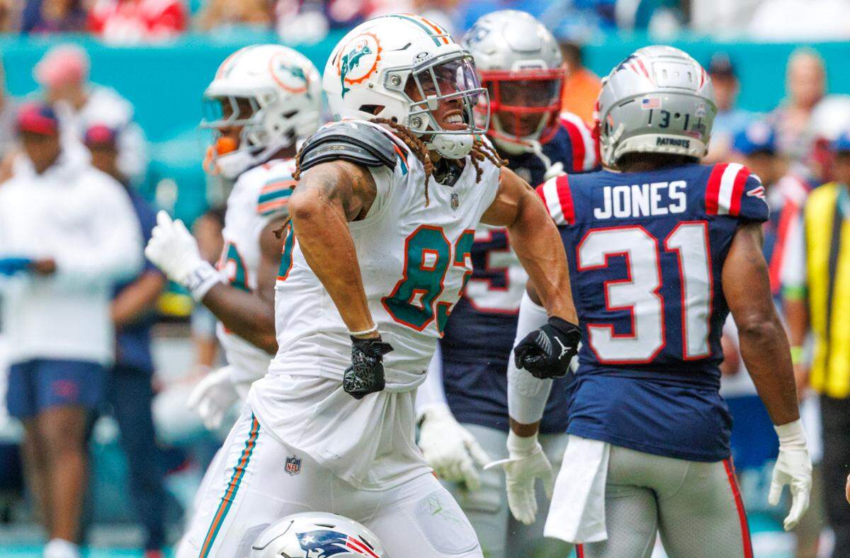 Miami Dolphins wide receiver Chase Claypool (83) reacts after a play during third quarter of an NFL football game against the New England Patriots at Hard Rock Stadium on Sunday, Oct. 29, 2023 in Miami Gardens, Fl.