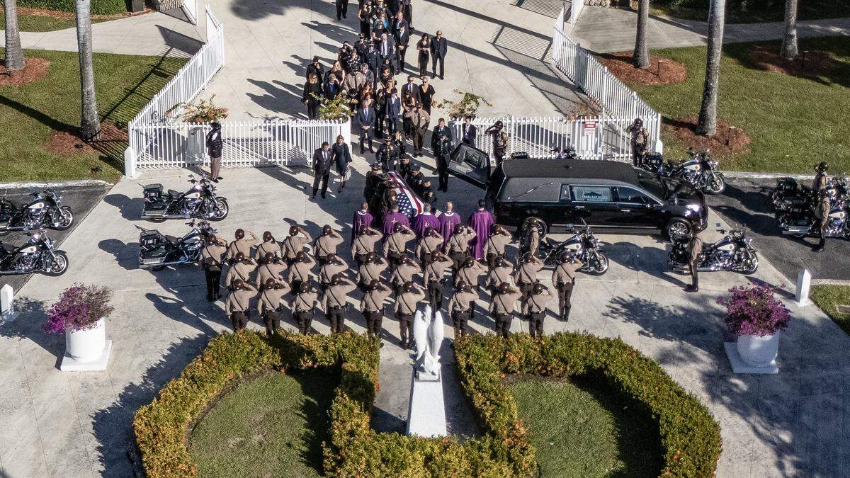 Funeral procession for Deputy Devin M. Jaramillo to Loan Depot Park following mass at St. Michael The Archangel Catholic Church in Miami, Florida, on Tuesday, November 18, 2025. Deputy Devin M. Jaramillo, died on the line of duty November 7 after being shot in southwest Miami-Dade County.