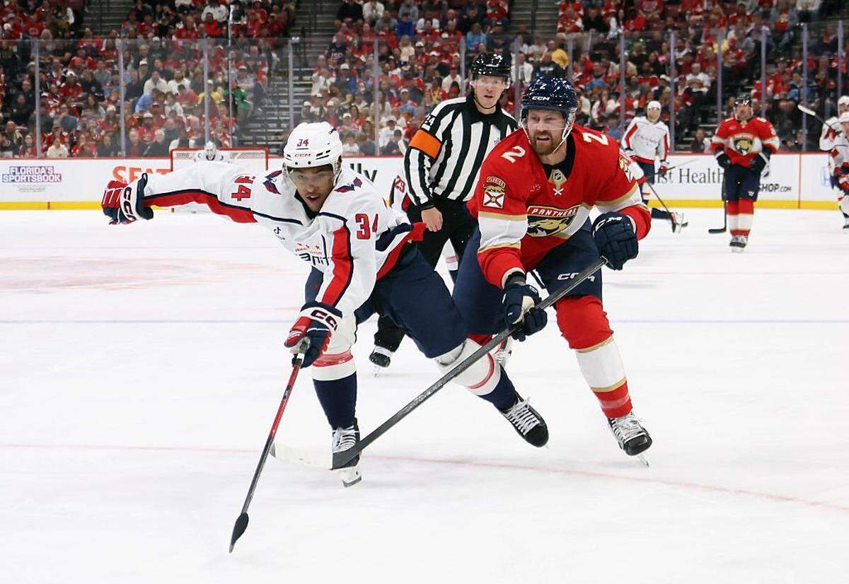 SUNRISE, FLORIDA - NOVEMBER 13: Jeff Petry #2 of the Florida Panthers skates against Justin Sourdif #34 of the Washington Capitals at Amerant Bank Arena on November 13, 2025 in Sunrise, Florida. (Photo by Bruce Bennett/Getty Images)