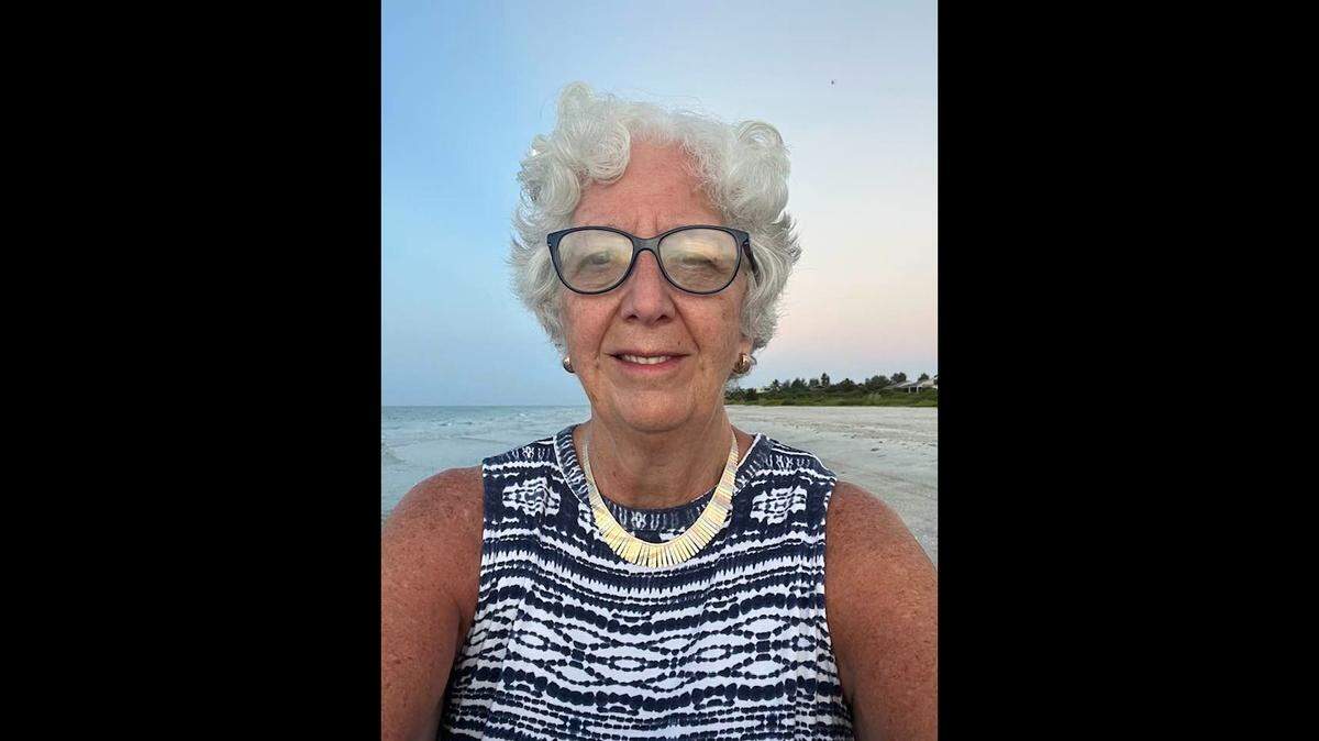 Sara McKinley on Coquina Beach, just off of Nerita Street on Sanibel, which is right near her duplex on Juniona Street, in Southwest Florida in July 2022.