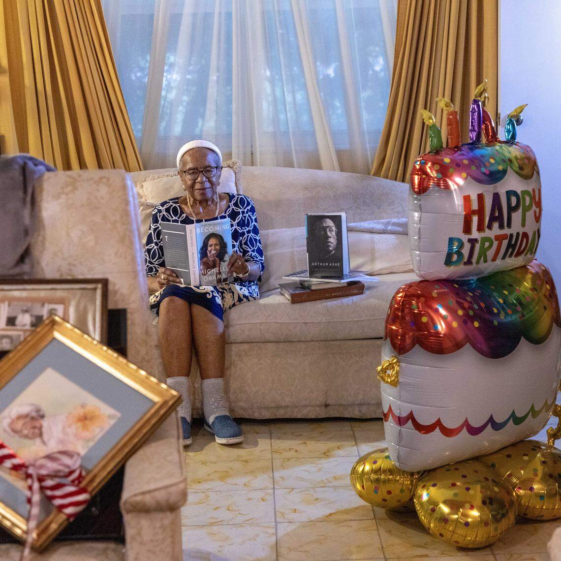 Thelma Vernell Anderson Gibson, the cherished icon of Coconut Grove, educators, and avid reader, is celebrating her 99th birthday this month and continues to be steward of beyond the Grove as she is photographed at her home on Tuesday, December 10, 2025, in Miami, Florida. Gibson's groundbreaking contributions to the community as a dedicated educator and an advocate for civil rights, Gibson played a vital role in promoting social justice and equality. She was instrumental in establishing programs that empowered youth and fostered cultural awareness. Her legacy is marked by her unwavering commitment to uplifting her community, making her a beloved figure whose impact continues to inspire future generations.