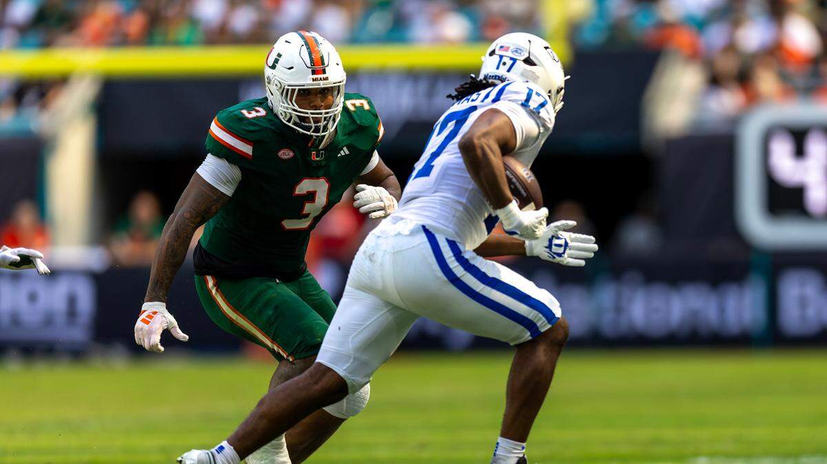 Miami Hurricanes defensive lineman Akheem Mesidor (3) chases down Duke Blue Devils running back Star Thomas (17) during the first half of an ACC football game at Hard Rock Stadium on Saturday, Nov. 2, 2024, in Miami Gardens, Fla.