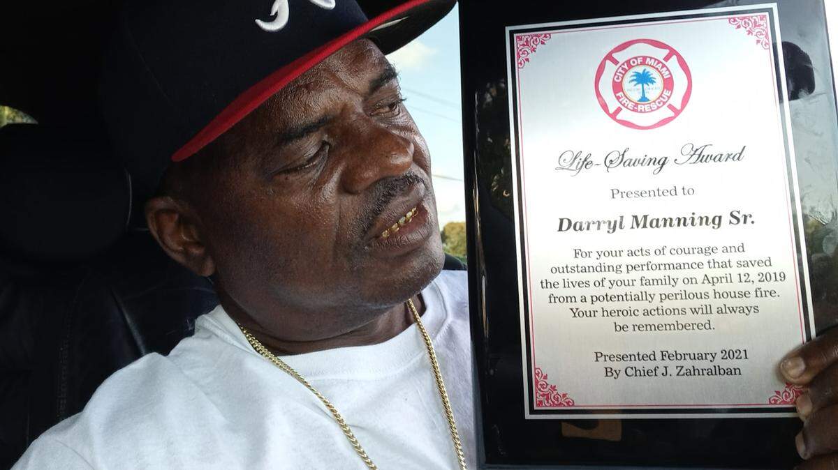 Darryl Manning received the Life Saving Award from Miami Fire Rescue Feb. 26, 2021, for saving his wife, stepson and two daughters from a house fire in 2019.
