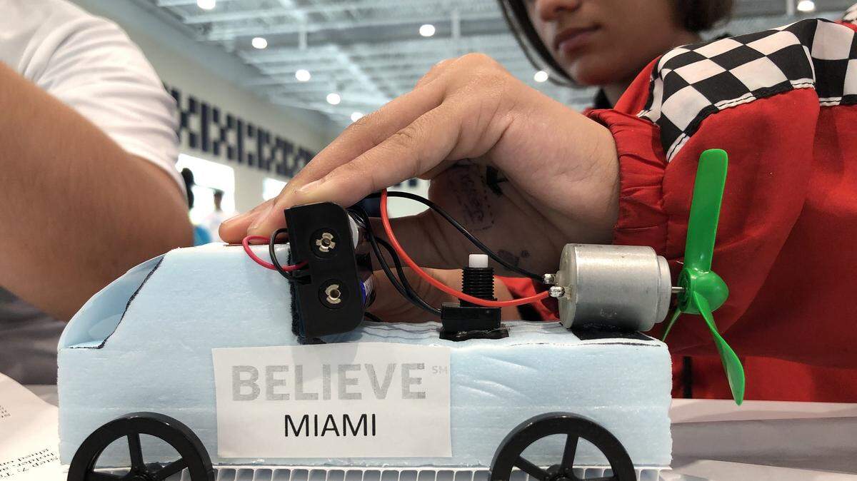 To kick off the ATT Believe Miami initiative, more than 100 local youths designed, built and raced cars as part of Dibia DREAM’s STEM Saturdays program to learn about force and motion.