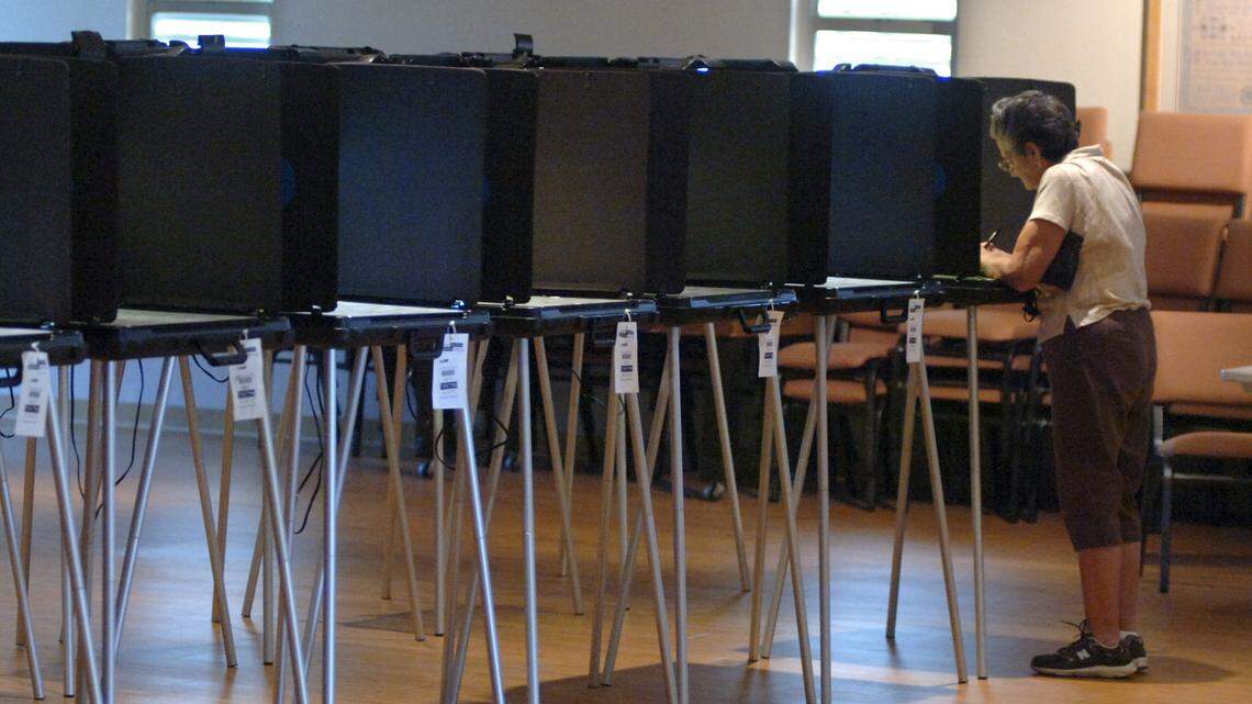 A voter has the South Kendall Community Church to herself at 16550 SW 147 avenue, during the recall election in Miami-Dade County. No lines were at the polling place but a steady stream of voters came throughout the morning.