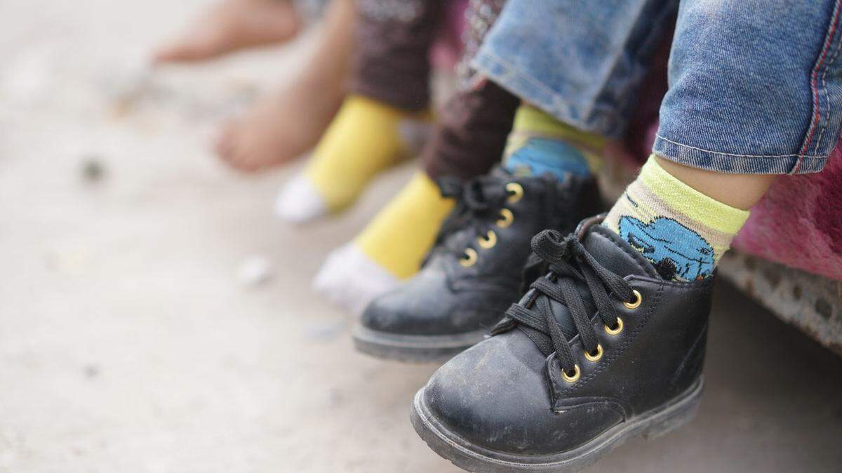 Working-class parents are using funds from the expanded Child Tax Credit program to buy clothing, healthier foods and other basics for their families.