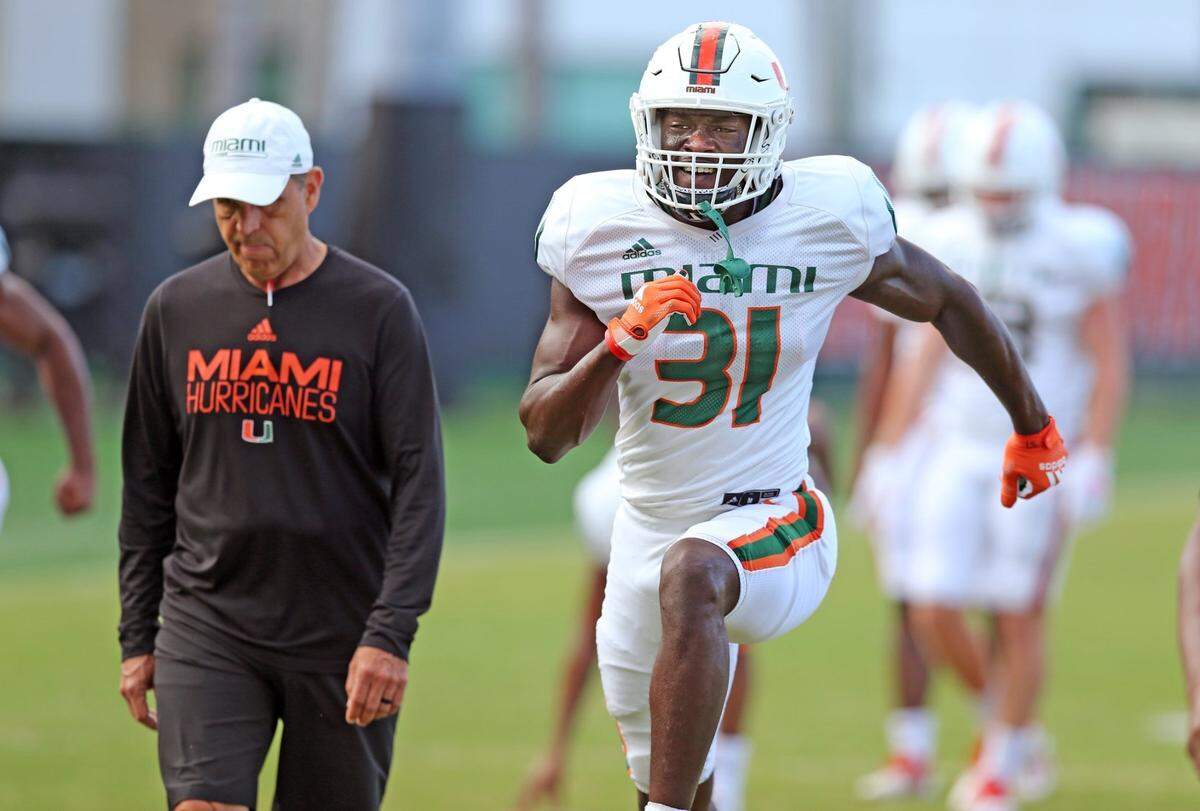 Miami Hurricanes Wesley Bissainthe (31) works out during practice at the University of Miami’s Greentree Practice Field in Coral Gables, Florida on Tuesday, April 12, 2022.