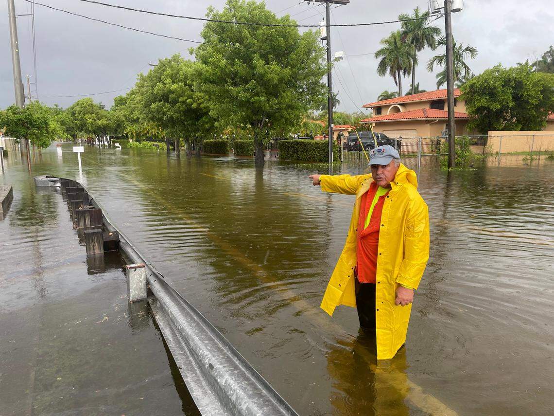 Jorge Saavedra, who works for the Miami-Dade County Transportation and Public Works office, spent Friday and Saturday unclogging drains in the western area of Miami-Dade County.