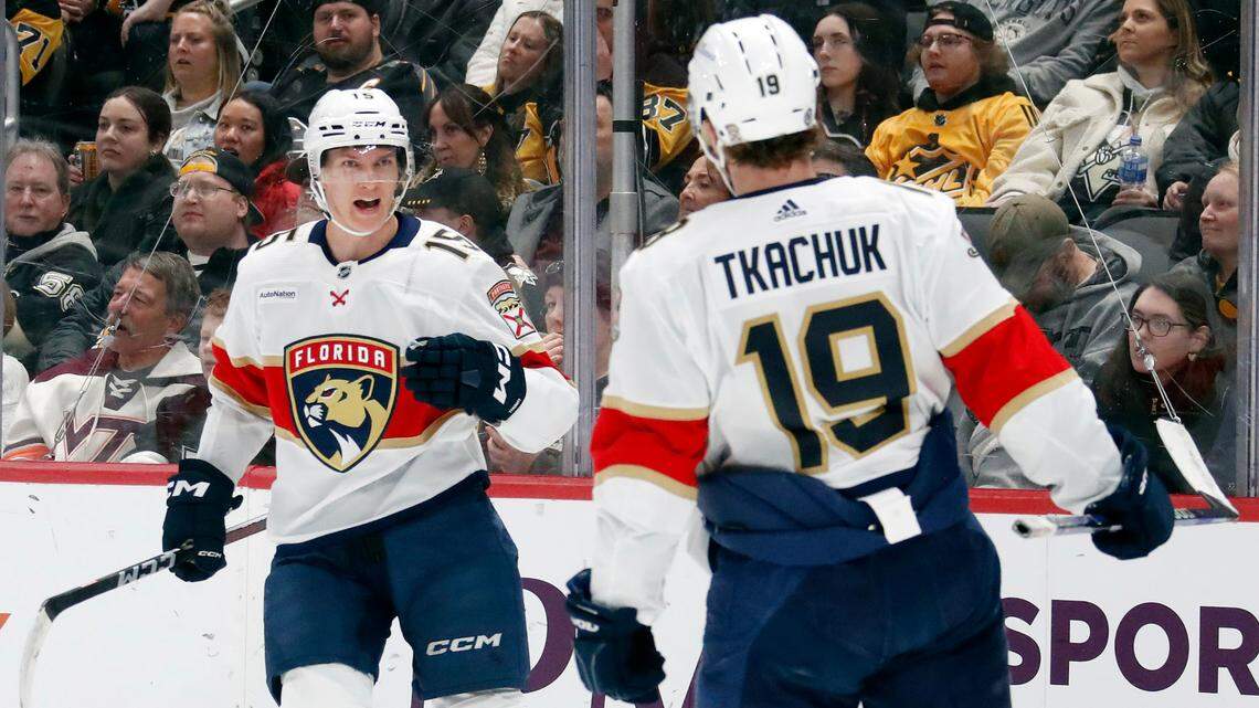 Feb 14, 2024; Pittsburgh, Pennsylvania, USA; Florida Panthers center Anton Lundell (15) reacts after scoring a goal as left wing Matthew Tkachuk (19) celebrates against the Pittsburgh Penguins during the second period at PPG Paints Arena. Florida won 5-2.