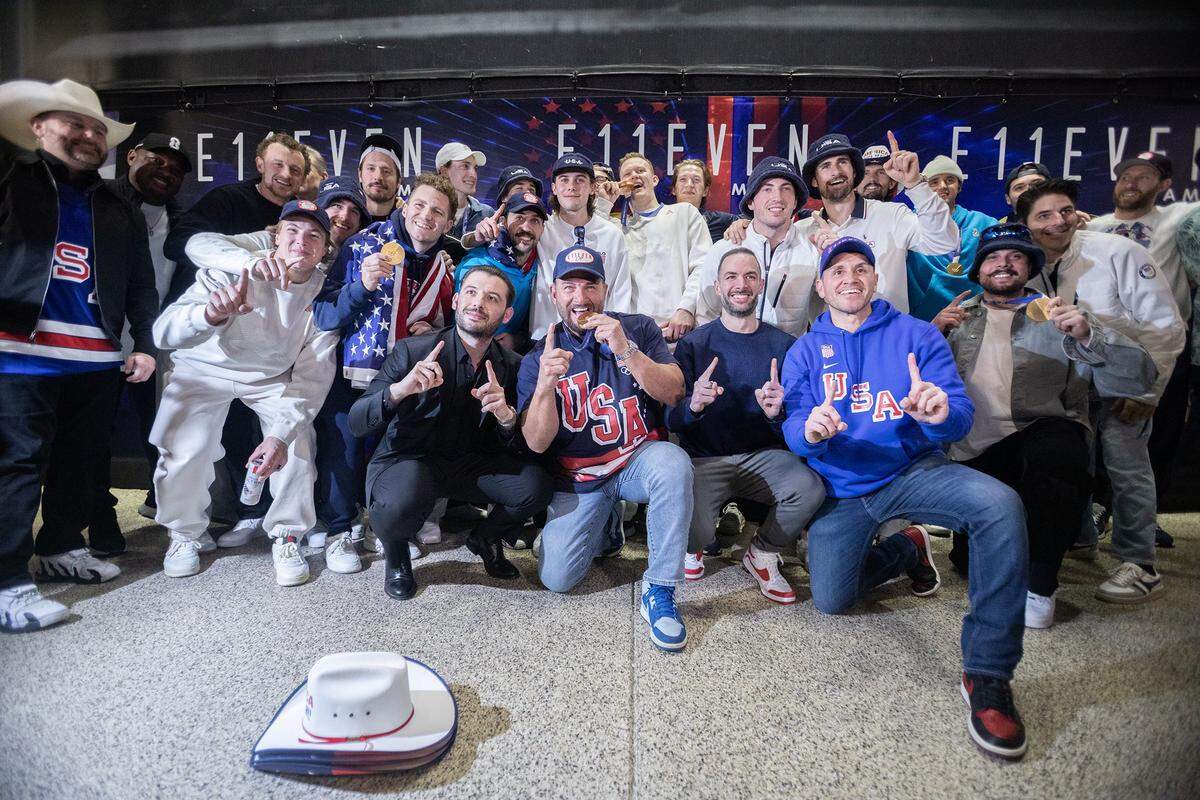Members of the United States men’s hockey team pose for a group photo at E11EVEN Miami during their gold-medal celebration on Monday, Feb. 23, 2026, in Miami, after returning from Italy following their victory over Canada at the 2026 Winter Olympics.