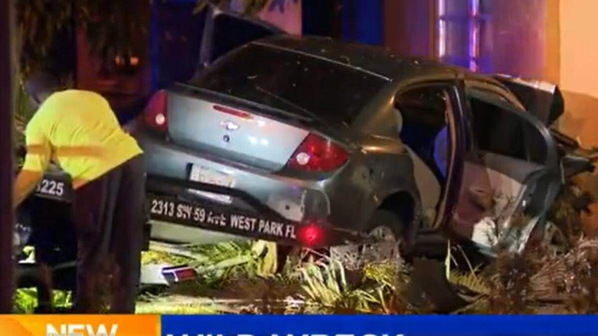 A blue Chevy Cobalt swerved off the road and into the front of a home in the 6600 block of Miramar Parkway at about 2 a.m. April 16, 2021, according to Miramar police. This is a screen grab from a CBS4 broadcast.