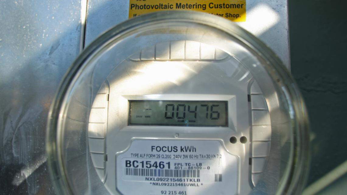 FPL meter on a house in Broward County shows usage and amount generated by solar panels.