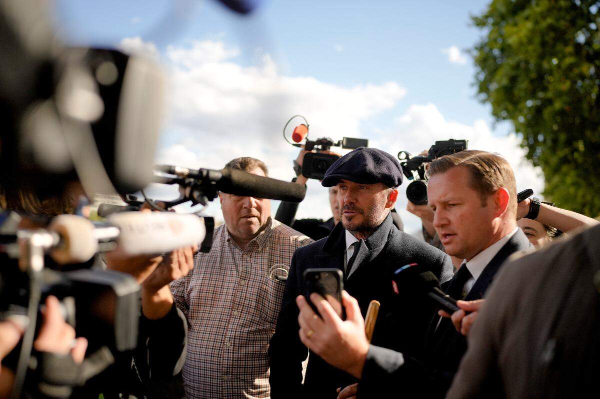 David Beckham speaks to the media after leaving Westminster Palace where he paid respects to the late Queen Elizabeth II, at Westminster Hall, London, England, Friday, Sept. 16, 2022. The Queen will lie in state in Westminster Hall for four full days before her funeral on Monday Sept. 19.