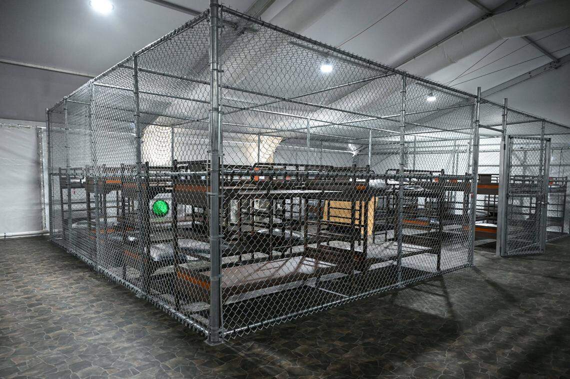 Beds are seen inside a migrant detention center, dubbed “Alligator Alcatraz,” located at the site of the Dade-Collier Training and Transition Airport, as US President Donald Trump tours the facility in Ochopee, Florida on July 1, 2025. President Trump is visiting a migrant detention center in a reptile-infested Florida swamp dubbed “Alligator Alcatraz.” Trump will attend the opening of the 5,000-bed facility -- located at an abandoned airfield in the Everglades wetlands -- part of his expansion of deportations of undocumented migrants, his spokeswoman said. (Photo by ANDREW CABALLERO-REYNOLDS / AFP) (Photo by ANDREW CABALLERO-REYNOLDS/AFP via Getty Images)