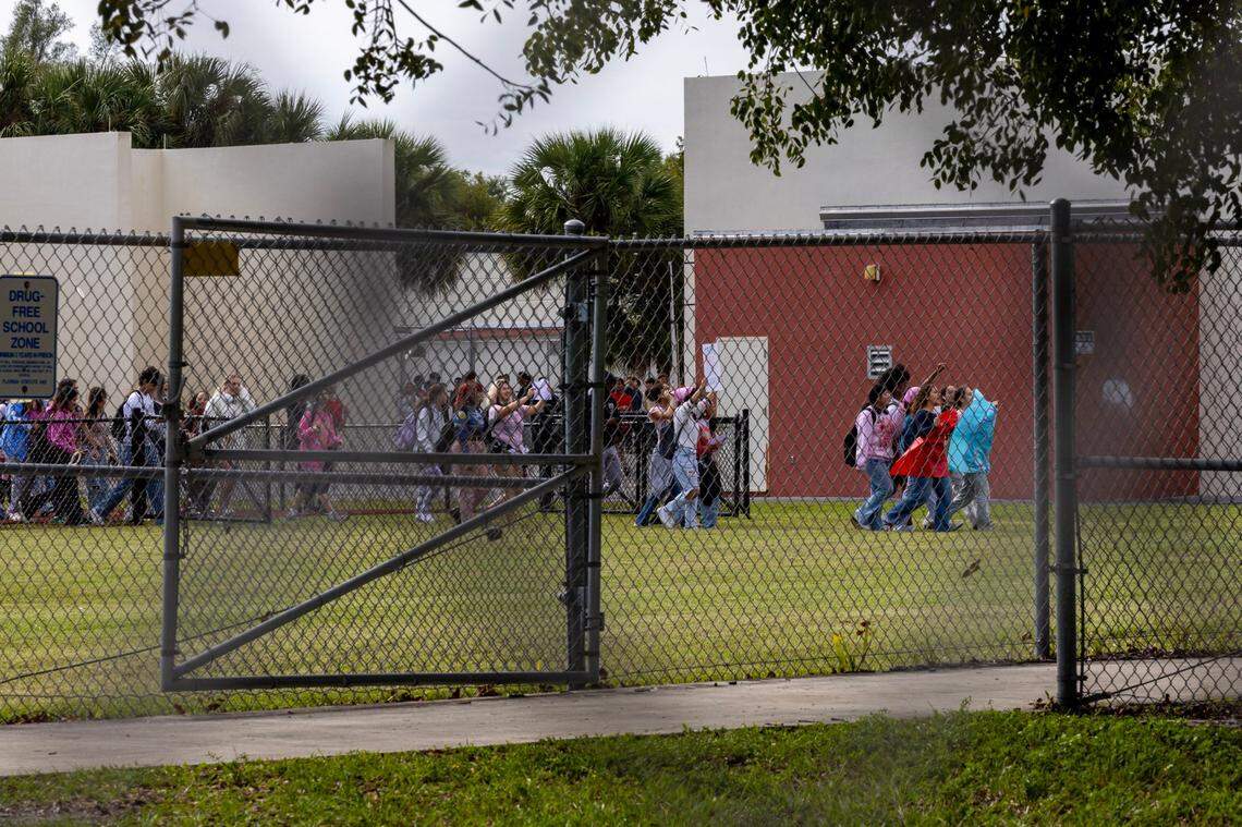 Monarch High School students conduct a walkout on Tuesday, Nov. 28, 2023 after the principal, James Cecil, and other staff members were removed from their positions pending an investigation. The reassignments occurred because a trans student had been playing volleyball at the school in Coconut Creek, Florida.