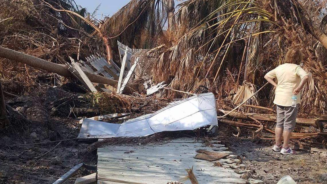 Kathy Reitzel stares at the ruins of her home on Big Pine Key after Hurricane Irma swept through in 2017. She’s hoping to sell her home to Monroe County through a federally funded program run through the state of Florida.