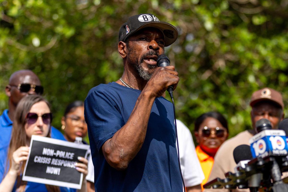 Lonnie Armstrong, cousin of shooting victim Donald Armstrong, speaks to the media during a press conference held by the Healing and Justice Center across the street from the scene of the shooting at NW 58th St and NW 7th Court, in Liberty City, Florida, on Thursday, March 14, 2024. City of Miami police officers shot Donald Armstrong last week more than five times while responding to an emergency call during a mental health crisis.