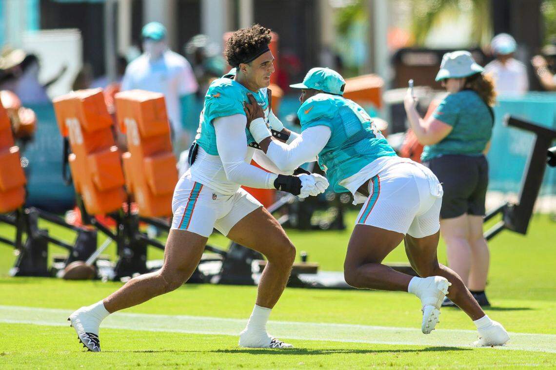 Miami Dolphins linebacker Jaelan Phillips (15) and linebacker Bradley Chubb (2) works out during training camp at Baptist Health Training Facility in Miami Gardens, Florida, Monday, July 31, 2023.