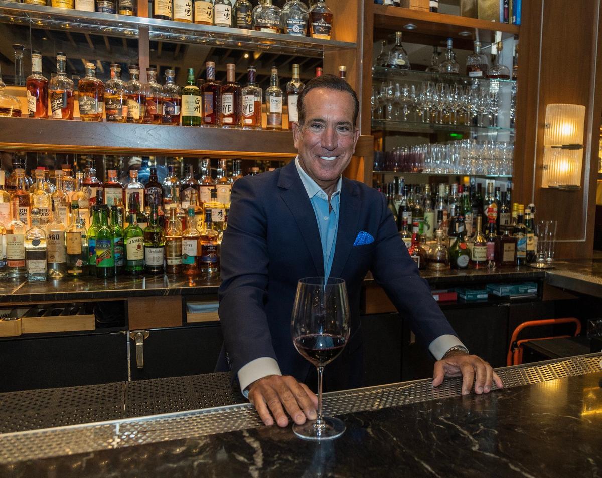 Owner Thomas P. Angelo at the bar of Fiola in Coral Gables.