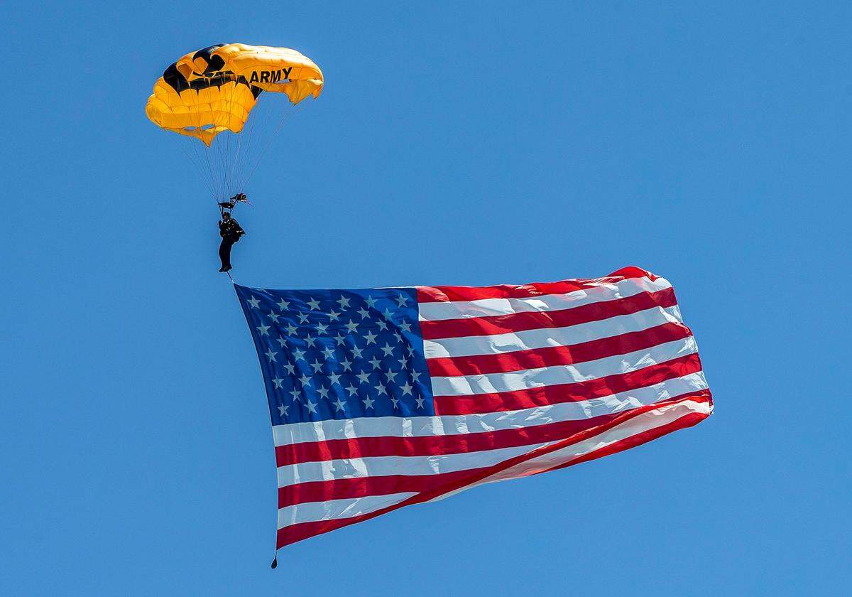 A member of the United States Army Parachute Team descends during Hyundai Air and Sea Show in Miami Beach on Saturday, May 29, 2021.