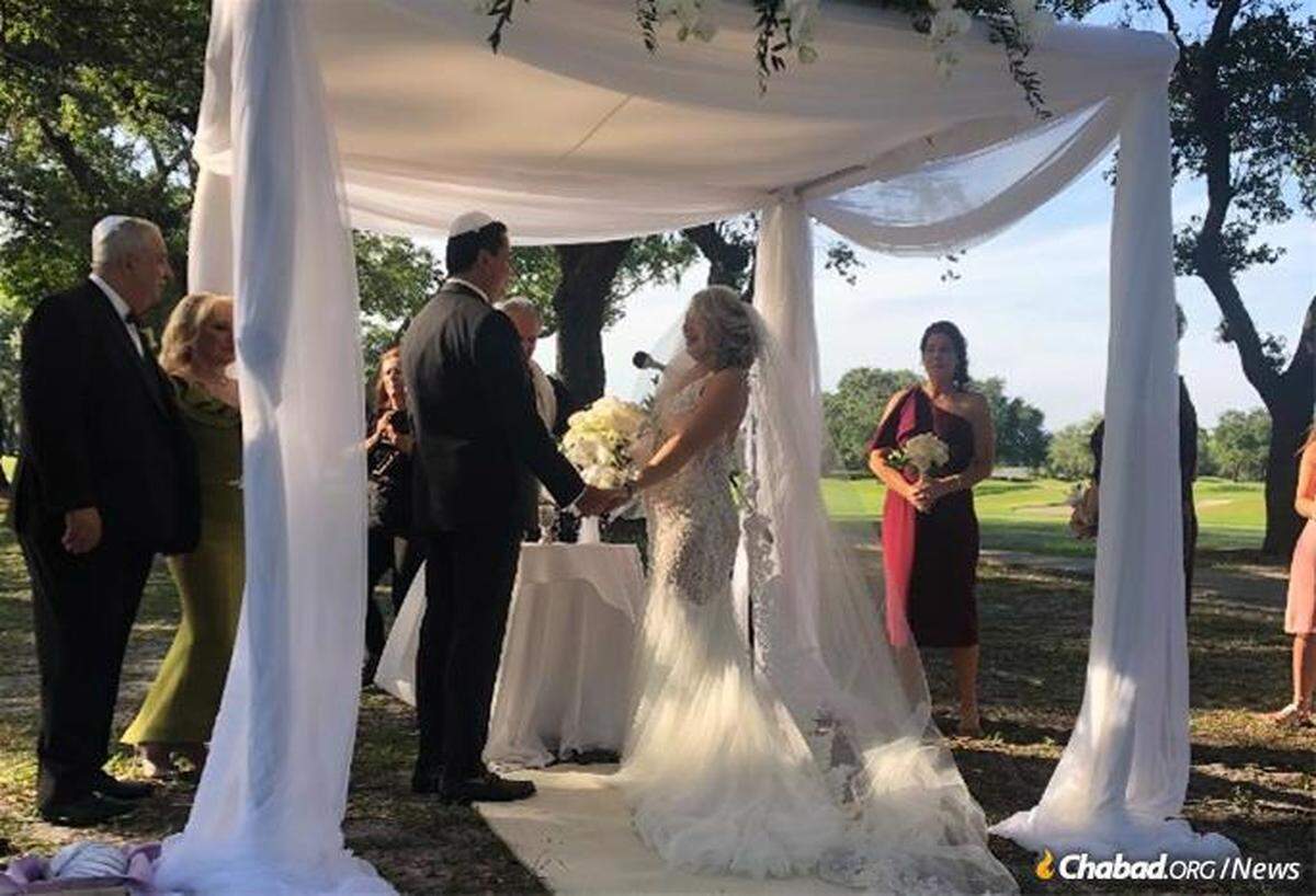 Ruslan Manashirov and Nicole Doran-Manashirov pictured on their wedding day.