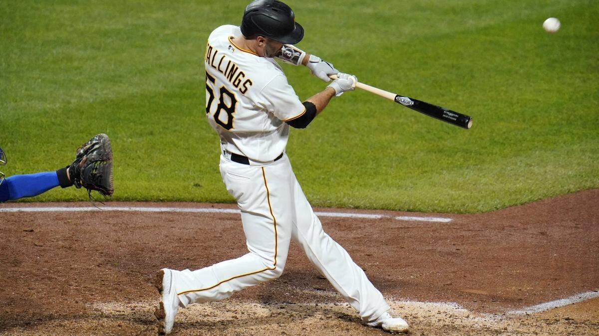 Pittsburgh Pirates’ Jacob Stallings hits a walk-off solo home run off Chicago Cubs relief pitcher Andrew Chafin during the bottom of the ninth inning of a baseball game in Pittsburgh, Tuesday, Sept. 22, 2020. The Pirates won 3-2. (AP Photo/Gene J. Puskar)