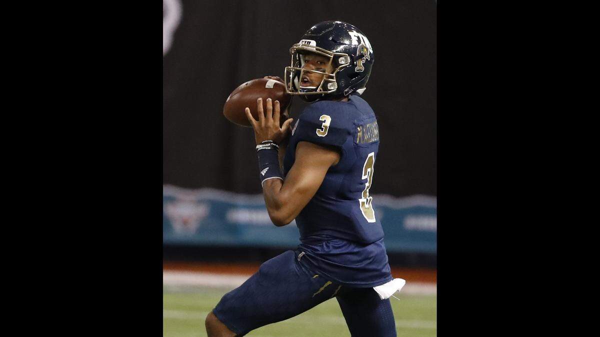 FIU Panthers quarterback Maurice Alexander (3) looks to pass in the second quarter during the Bad Boy Mowers Gasparilla Bowl at Tropicana Field in St. Petersburg, Florida on Thursday, December 21, 2017