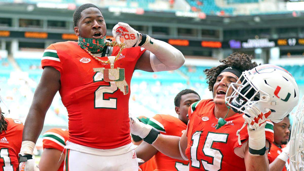 Miami Hurricanes defensive end Quincy Roche (2) wears the turnover chain after he recovers a third quarter fumble as they play the Pittsburgh Panthers at Hard Rock Stadium in Miami Gardens, Florida, Saturday, October 17, 2020.