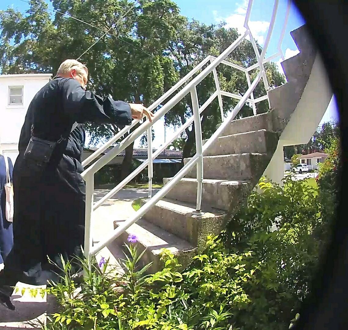 Security camera footage shows Rev. Joseph Lucas of the Orthodox Church in America walking up to the Saints Peter and Paul Russian Orthodox Greek Catholic Church in Little Havana in May 2023, where he was accompanied by a locksmith to change the locks on the building.