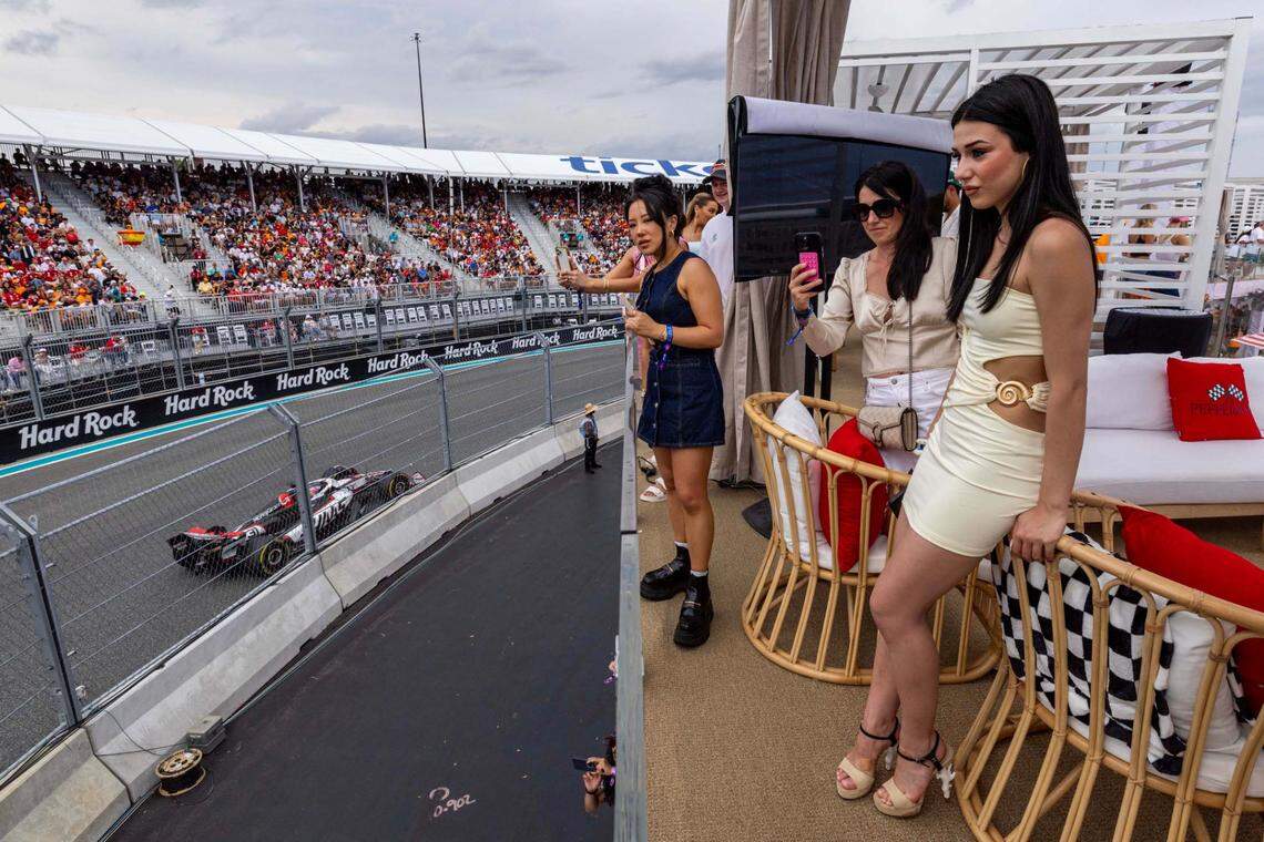 Sonya Styles, 18, left, watches the race with friends from The Beach Club inside Miami International Autodrome during Formula One Miami Grand Prix at the Miami International Autodrome on Sunday, May 4, 2025, in Miami Gardens, Fla.