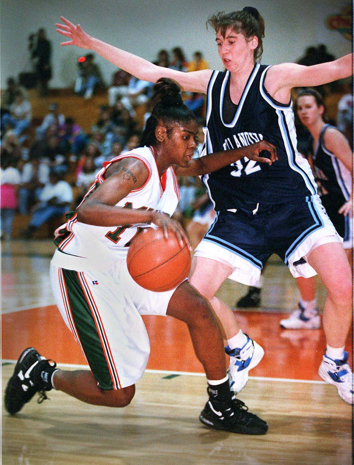 02/05/95...for sports...mhs photo by Jeffery A. Salter...UM basketball player Octavia Blue in game action agianst Villanova playerDenise Dillon.