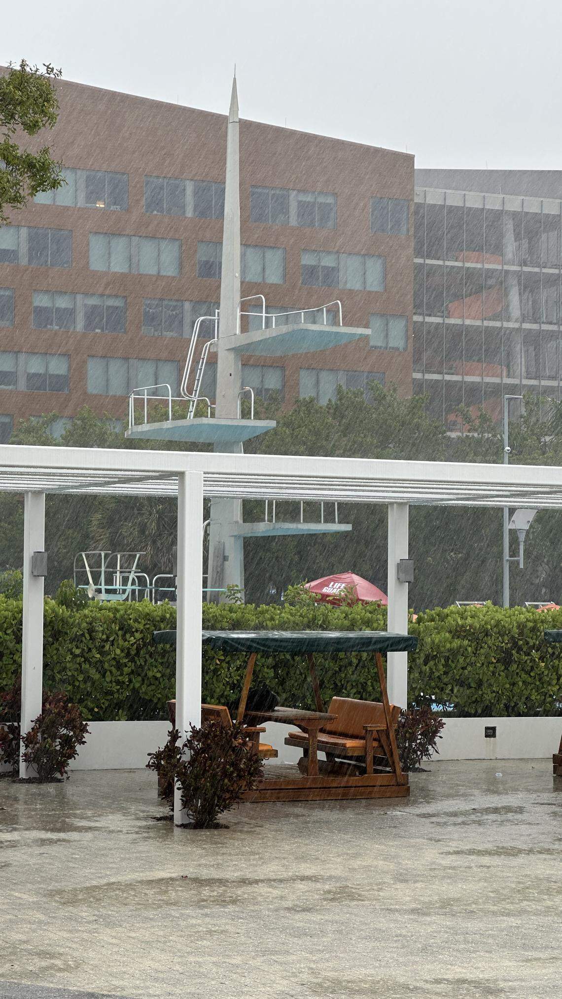 The University of Miami patio adjacent to the UC Pool seemed to have as much rain pooling as the diving well contained just before 1 p.m. Friday, Sept. 5, 2025. That’s an exaggeration, but students did see a walloping downpour.